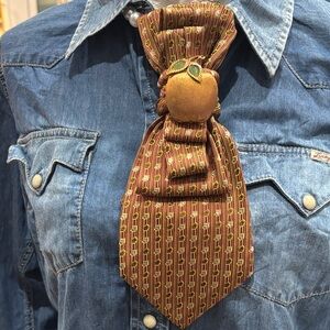 Chic Brown Patterned Scarf with Gold Accents